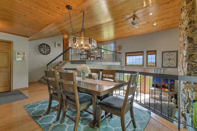 1506 Jackson Ave NE, Saint Michael, MN 55376 - dining space with a chandelier, wood ceiling, wood finished floors, a ceiling fan, and stairway