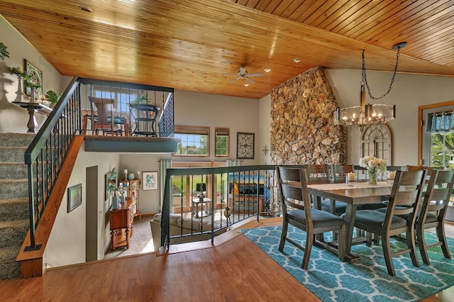 1506 Jackson Ave NE, Saint Michael, MN 55376 - dining room with ceiling fan, wooden ceiling, a chandelier, wood finished floors, and high vaulted ceiling