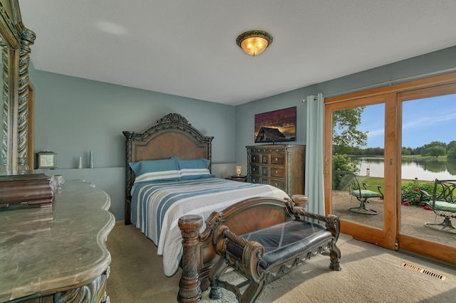 1506 Jackson Ave NE, Saint Michael, MN 55376 - bedroom with carpet floors and access to outside