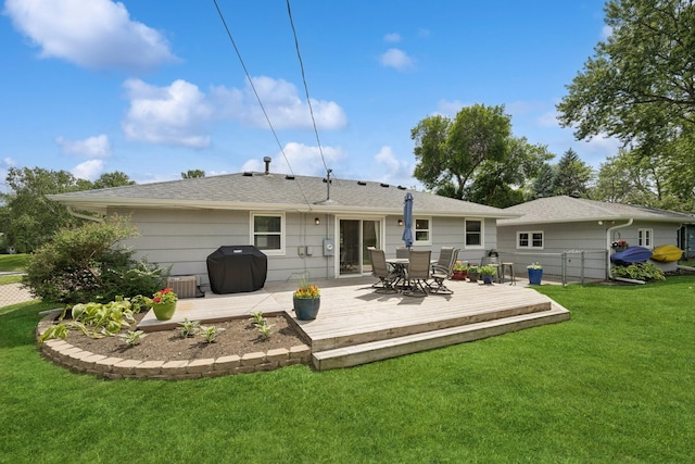 3300 88th St, Bloomington, MN 55431 - rear view of property featuring a wooden deck, outdoor dining space, a lawn, and a shingled roof