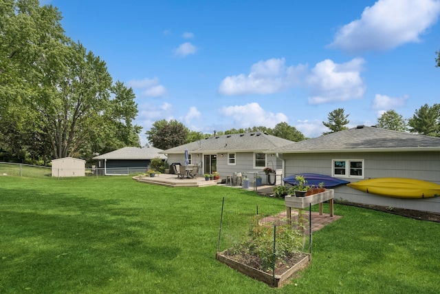 3300 88th St, Bloomington, MN 55431 - back of property with a garden and a shingled roof