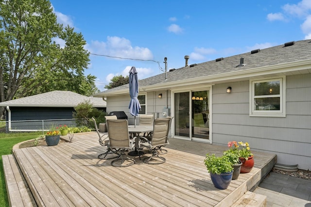 3300 88th St, Bloomington, MN 55431 - wooden deck featuring outdoor dining area