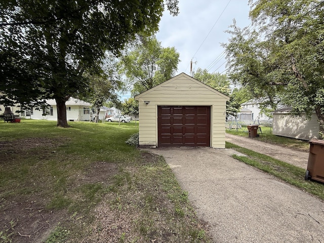 1202 4th St, Montevideo, MN 56265 - detached garage featuring asphalt driveway