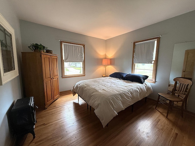 1202 4th St, Montevideo, MN 56265 - bedroom with light wood finished floors and baseboards