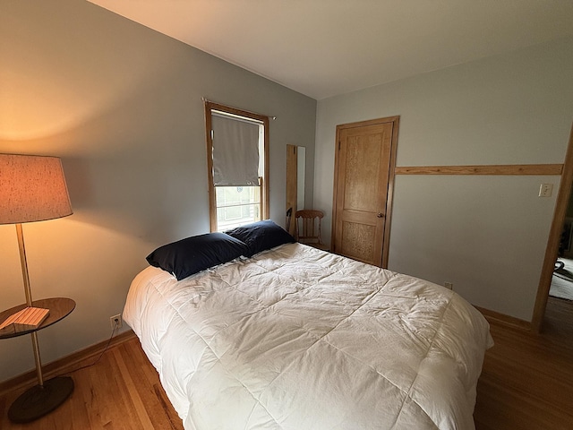 1202 4th St, Montevideo, MN 56265 - bedroom with wood finished floors and baseboards