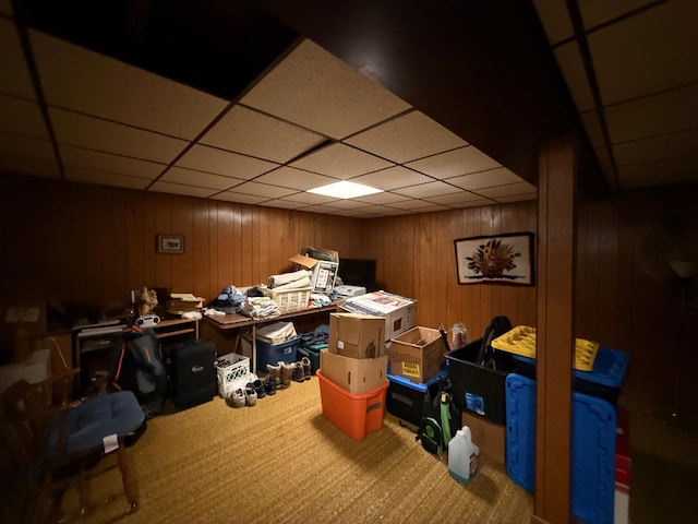 1202 4th St, Montevideo, MN 56265 - finished basement with a drop ceiling, carpet flooring, wooden walls, and an office area