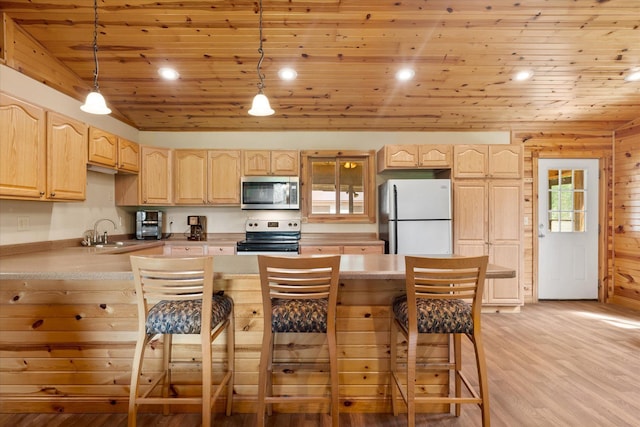 2630 320th St, Cushing, WI 54006 - kitchen featuring freestanding refrigerator, light brown cabinetry, stainless steel microwave, range with electric cooktop, and wooden ceiling