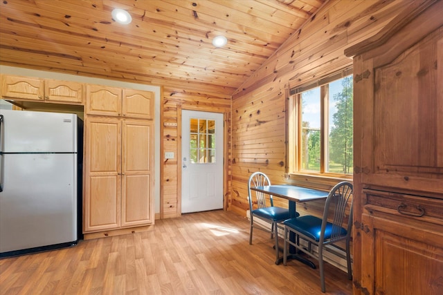 2630 320th St, Cushing, WI 54006 - dining room featuring wooden ceiling, light wood-style floors, vaulted ceiling, wooden walls, and recessed lighting