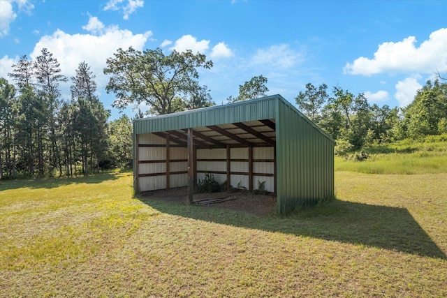2630 320th St, Cushing, WI 54006 - view of pole building with a detached carport and a lawn
