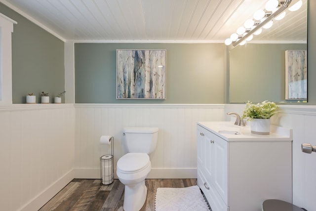 2820 Overlook Dr, Bloomington, MN 55431 - bathroom featuring vanity, wood finished floors, wainscoting, wooden ceiling, and ornamental molding