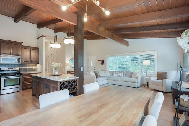2820 Overlook Dr, Bloomington, MN 55431 - dining space with a wood ceiling with exposed beams and light wood finished floors