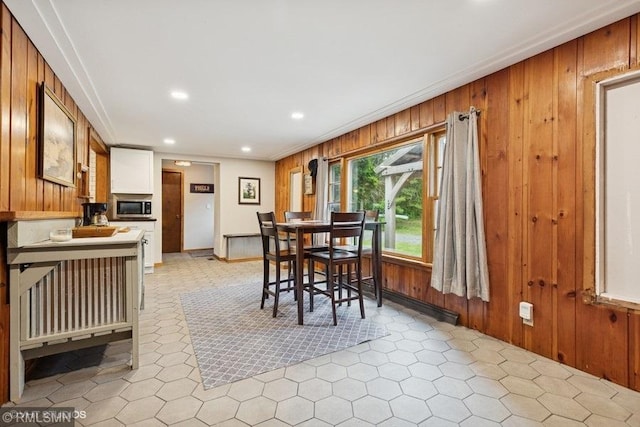 2818 Wilson Ave, Sterling Twp, WI 54024 - dining space with wood walls, recessed lighting, and ornamental molding