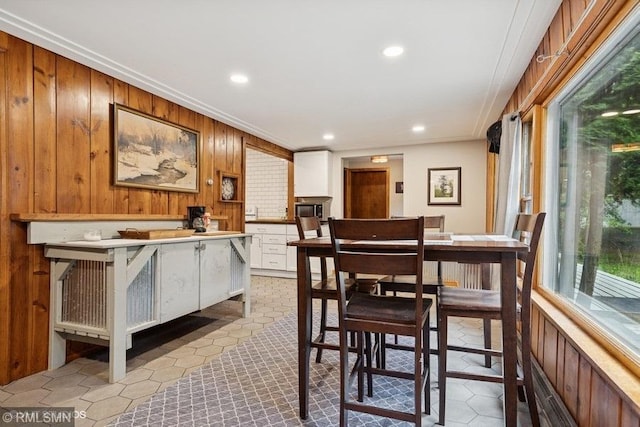 2818 Wilson Ave, Sterling Twp, WI 54024 - dining space with recessed lighting, wooden walls, and ornamental molding