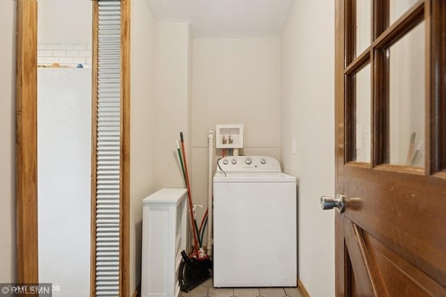 2818 Wilson Ave, Sterling Twp, WI 54024 - washroom featuring washer / dryer and light tile patterned flooring