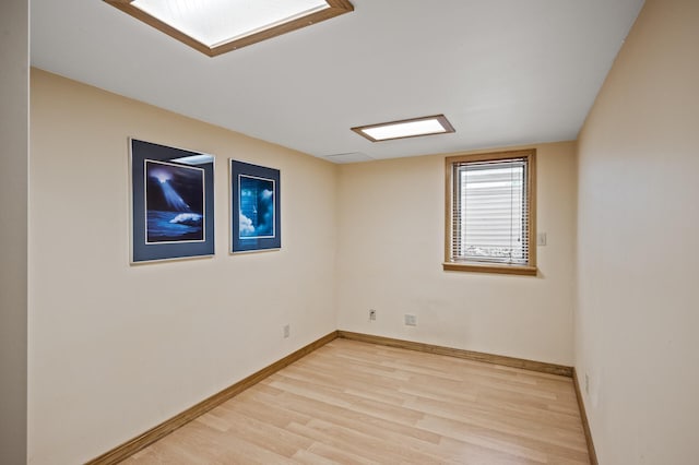 2233 Fremont Ave E, Saint Paul, MN 55119 - unfurnished room with light wood-style floors and baseboards