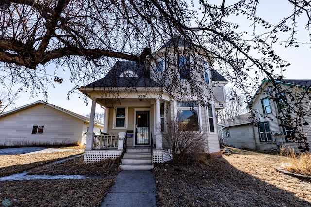320 Elm St, Crookston, MN 56716 - view of front of house featuring a porch