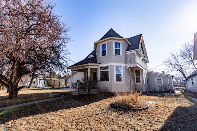 320 Elm St, Crookston, MN 56716 - view of front of property with a gazebo and roof with shingles