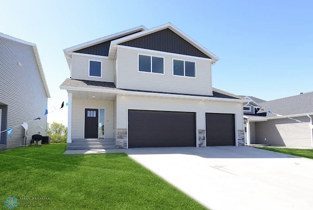 1276 Marlys Dr W, West Fargo, ND 58078 - modern home with a garage, board and batten siding, a front yard, driveway, and stone siding