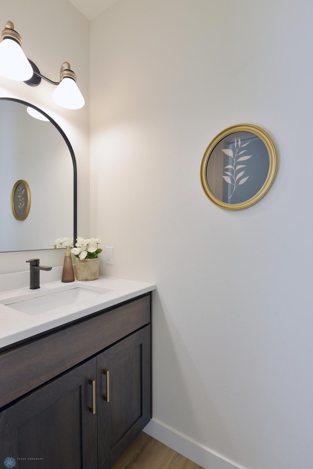 1276 Marlys Dr W, West Fargo, ND 58078 - bathroom featuring vanity and wood finished floors
