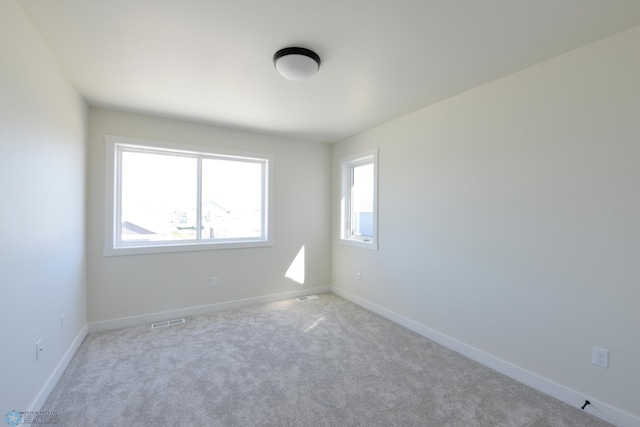 1276 Marlys Dr W, West Fargo, ND 58078 - unfurnished room featuring baseboards and carpet floors