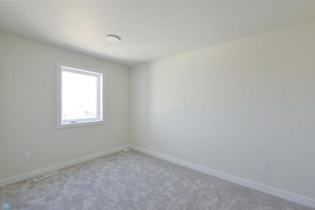 1276 Marlys Dr W, West Fargo, ND 58078 - unfurnished room featuring carpet floors and baseboards