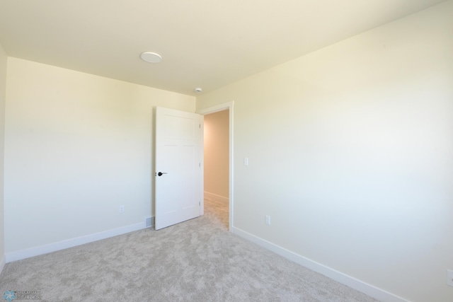 1276 Marlys Dr W, West Fargo, ND 58078 - carpeted spare room with baseboards