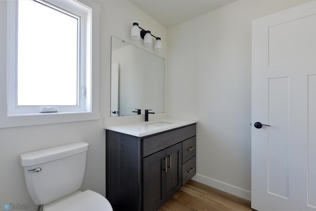 1276 Marlys Dr W, West Fargo, ND 58078 - bathroom featuring vanity and wood finished floors