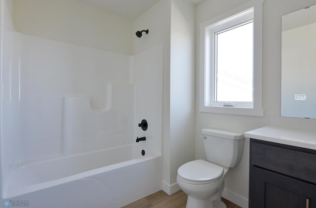 1276 Marlys Dr W, West Fargo, ND 58078 - bathroom featuring wood finished floors, vanity, and  shower combination