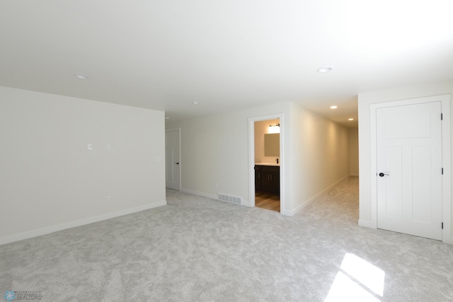 1276 Marlys Dr W, West Fargo, ND 58078 - empty room with light carpet and recessed lighting