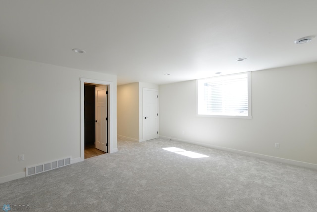 1276 Marlys Dr W, West Fargo, ND 58078 - carpeted empty room with baseboards and recessed lighting