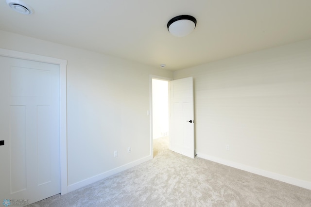 1276 Marlys Dr W, West Fargo, ND 58078 - unfurnished bedroom with carpet and baseboards