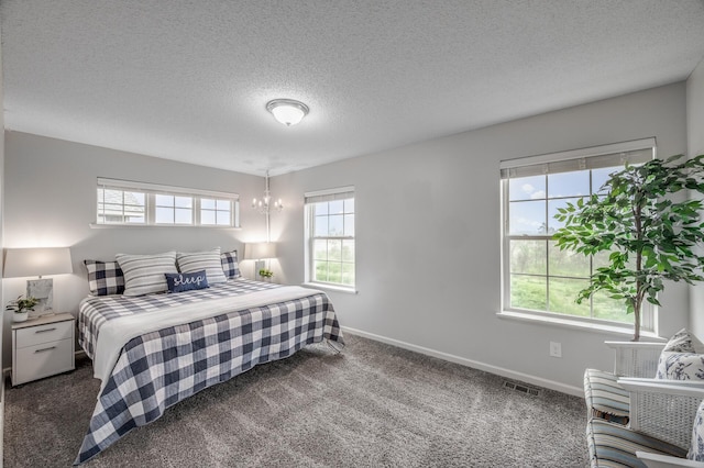 7558 Woods Edge Blvd, Lino Lakes, MN 55014 - bedroom featuring carpet flooring and a textured ceiling