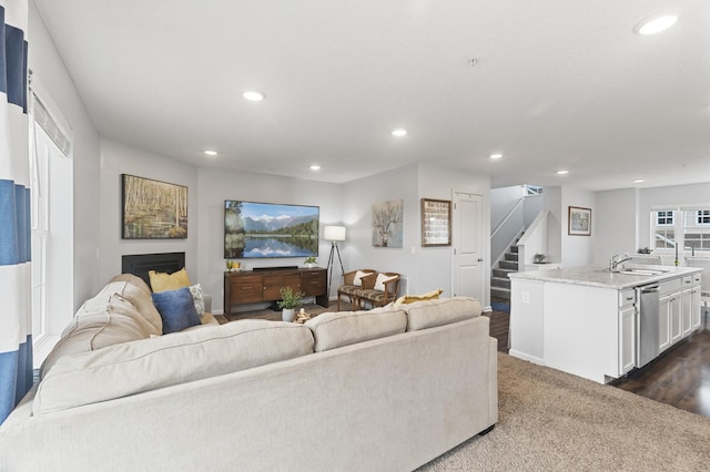 7558 Woods Edge Blvd, Lino Lakes, MN 55014 - living room featuring stairs, recessed lighting, and dark colored carpet