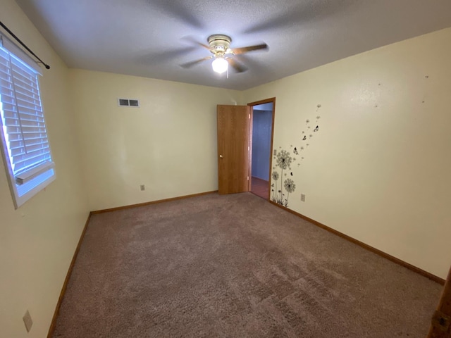 108 20th St S, Benson, MN 56215 - empty room featuring a ceiling fan and carpet floors