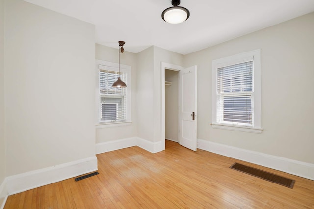 1339 Sargent Ave, Saint Paul, MN 55105 - unfurnished bedroom featuring wood-type flooring and a closet