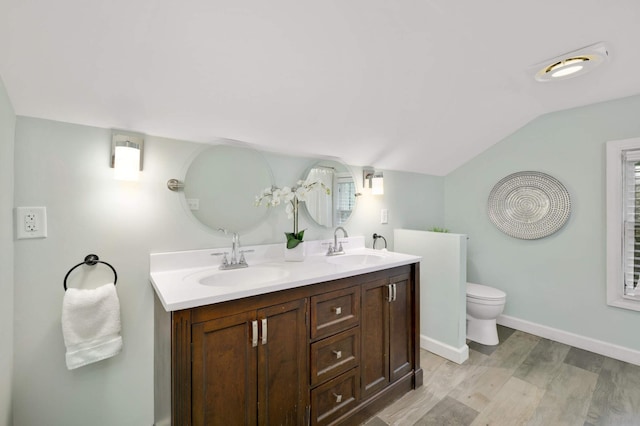 1339 Sargent Ave, Saint Paul, MN 55105 - full bath with wood finished floors, double vanity, and vaulted ceiling