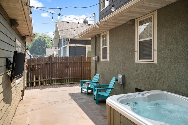 1339 Sargent Ave, Saint Paul, MN 55105 - view of patio featuring a hot tub