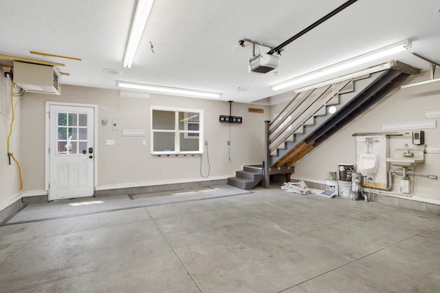 1339 Sargent Ave, Saint Paul, MN 55105 - garage with a garage door opener and baseboards