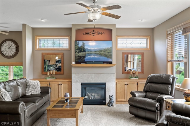 6831 Centerville Rd, Centerville, MN 55038 - carpeted living room featuring a ceiling fan and a glass covered fireplace