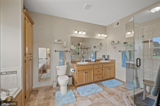 6831 Centerville Rd, Centerville, MN 55038 - bathroom with a stall shower, double vanity, a bath, and tile patterned flooring