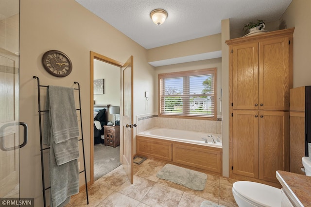 6831 Centerville Rd, Centerville, MN 55038 - bathroom featuring a bath, a shower stall, vanity, and a textured ceiling