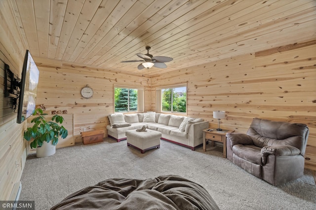 6831 Centerville Rd, Centerville, MN 55038 - living room with carpet flooring, wooden walls, ceiling fan, and wooden ceiling
