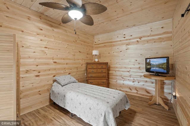 6831 Centerville Rd, Centerville, MN 55038 - bedroom featuring wood finished floors, wooden ceiling, wooden walls, and ceiling fan