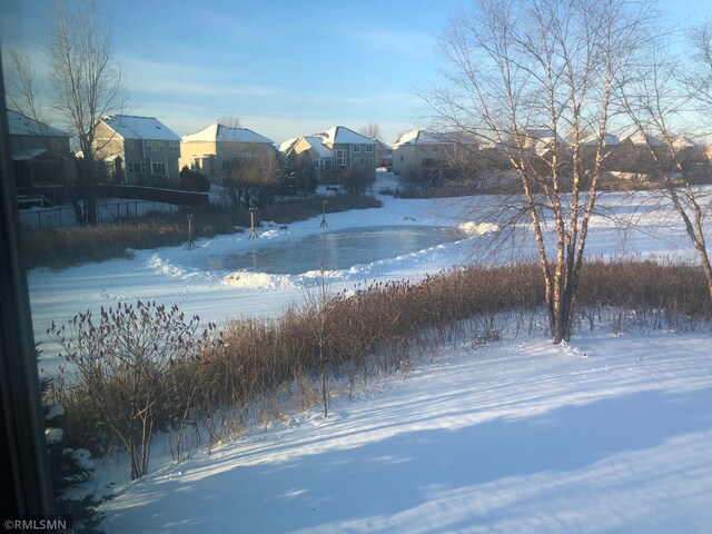 6831 Centerville Rd, Centerville, MN 55038 - snowy yard with a residential view