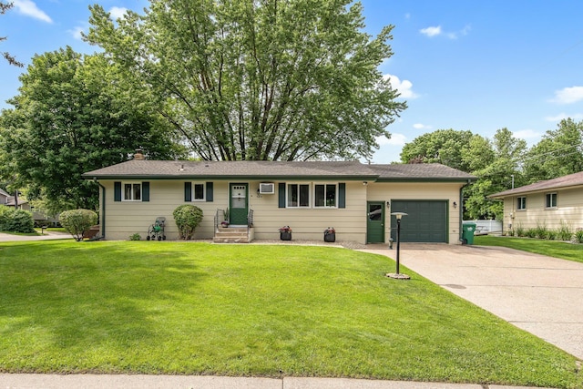 124 Willow Dr SW, Saint Michael, MN 55376 - ranch-style house with a garage, driveway, a front yard, and a chimney