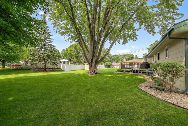 124 Willow Dr SW, Saint Michael, MN 55376 - view of yard with a deck