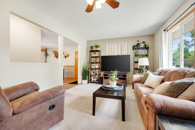 124 Willow Dr SW, Saint Michael, MN 55376 - living room featuring ceiling fan and light carpet