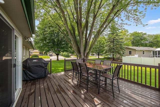 124 Willow Dr SW, Saint Michael, MN 55376 - wooden deck featuring area for grilling and outdoor dining space