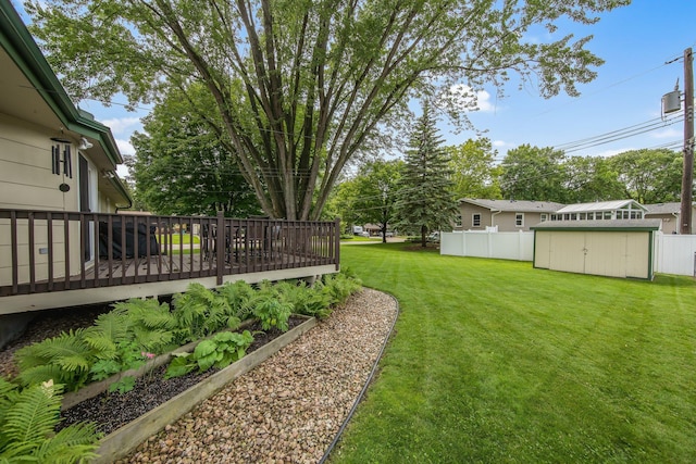 124 Willow Dr SW, Saint Michael, MN 55376 - view of yard with a storage unit and a wooden deck