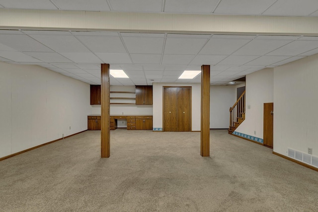 1044 Borgert Ave, Saint Cloud, MN 56303 - finished basement featuring light colored carpet, stairs, and a drop ceiling
